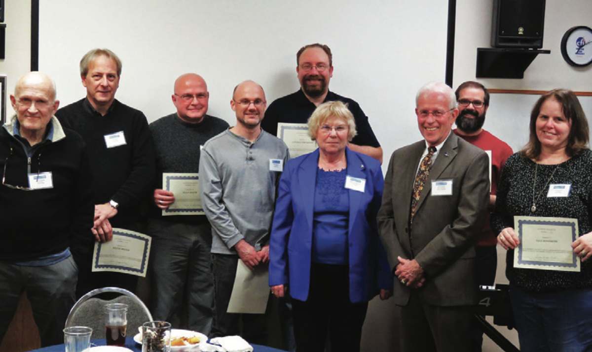 Volunteer award winners with CFI Indiana pose with their awards