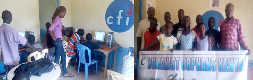 Kenyan children using computers, Kenyan class holding a banner that reads: Humanist Orphans Kenya